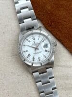 Rolex Date White Roman Dial Sapphire 15210 34 mm, automático.