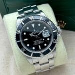 Rolex Submariner Date 40 mm 16610T 2009, automático.