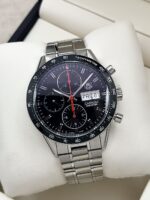 TAG Heuer Carrera Day-Date "Juan Manuel Fangio" 41 mm, automático.