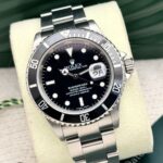 Rolex Submariner Date 40 mm 16610T 2005, automático.