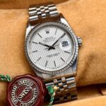 Rolex Datejust 36 mm "Tapestry" Silver Dial Engine Turned Jubilee, automático.